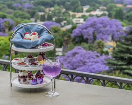 4 reasons to visit Flames and Four Seasons Hotel The Westcliff this jacaranda season (October 2025)