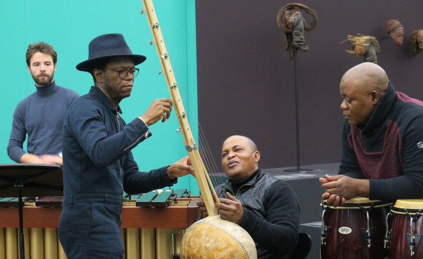 guerillaclassics peforming with traditional African instruments