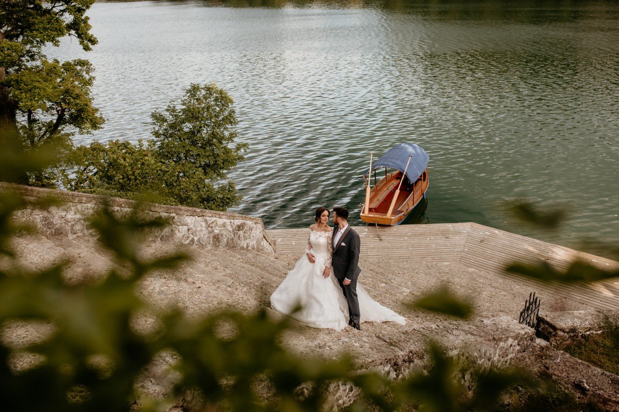 Bride and groom by Lake Bled