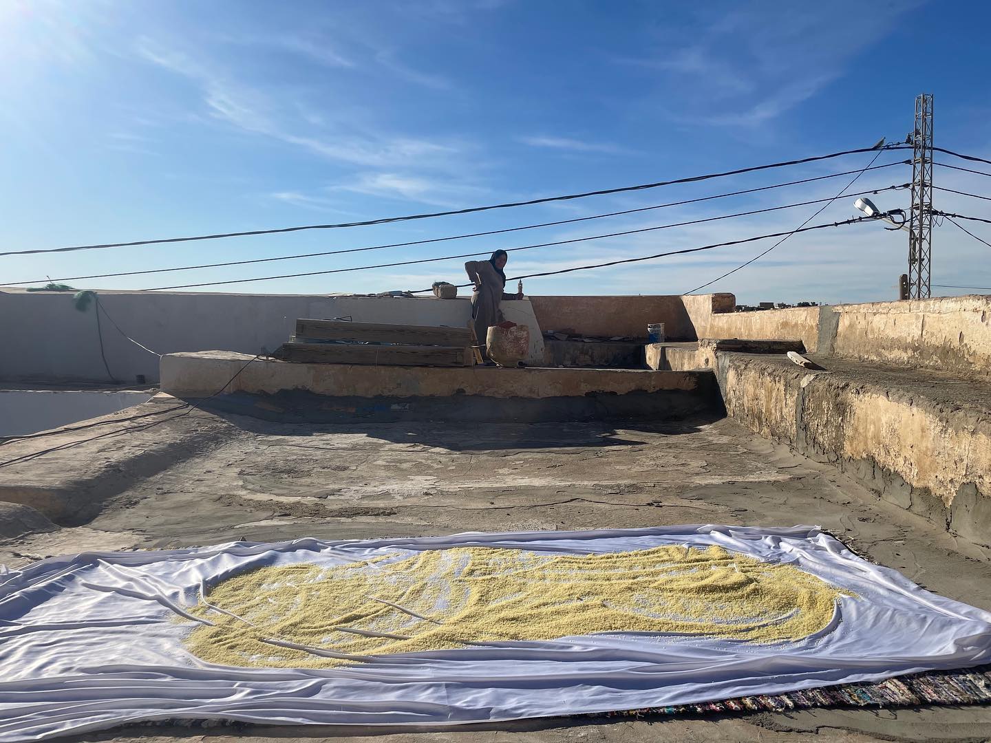 Couscous being dried on a rooftop in Nefta. Photo: Cooking Sunshine.