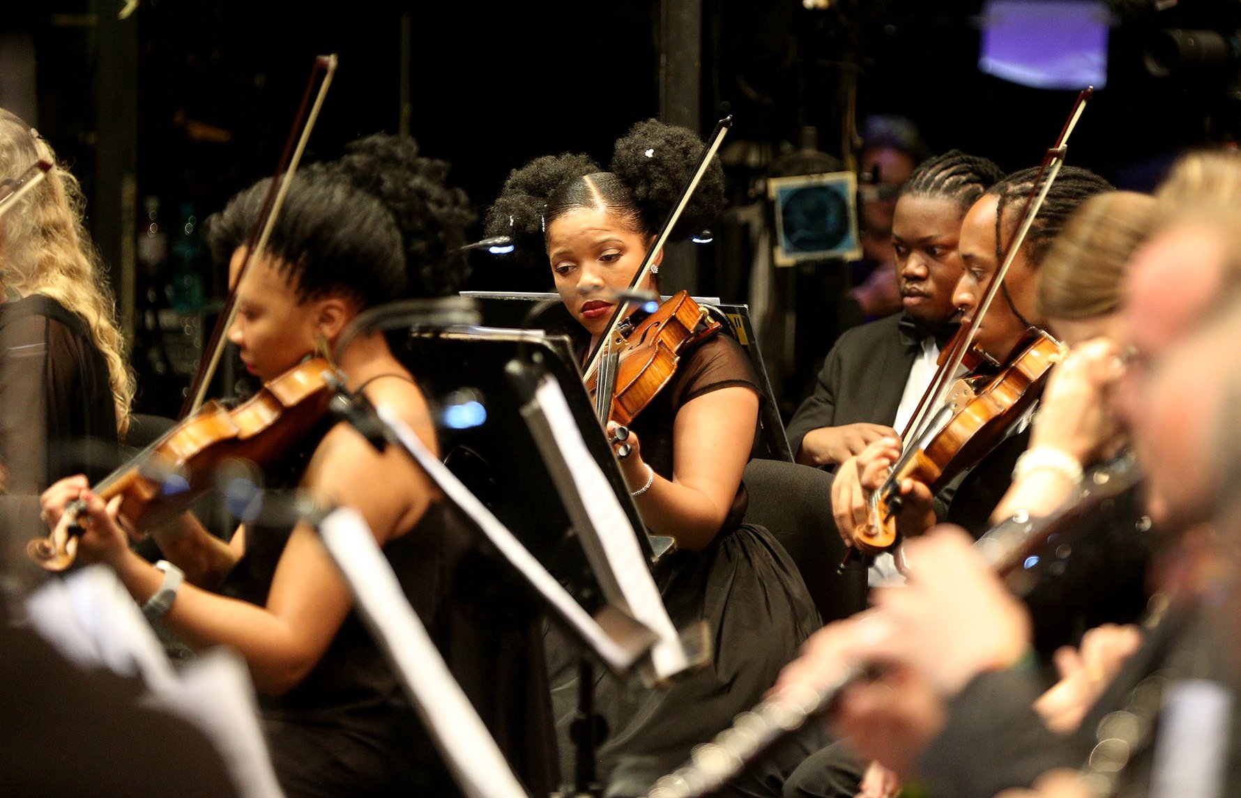 Members of the Mzansi National Philharmonic Orchestra weaving their magic in performance.