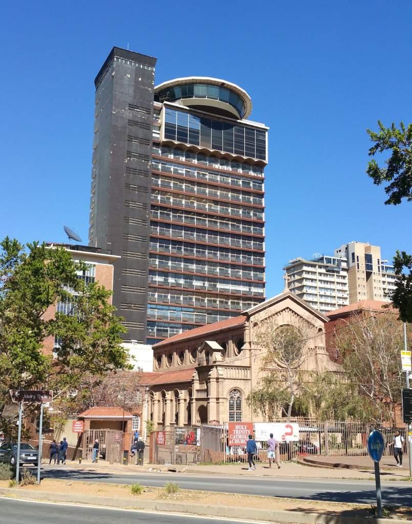 The iconic Lawson's Corner building with its revolving top floor was acquired by the University of Witswatersrand 1976. Photo: The Heritage Portal.